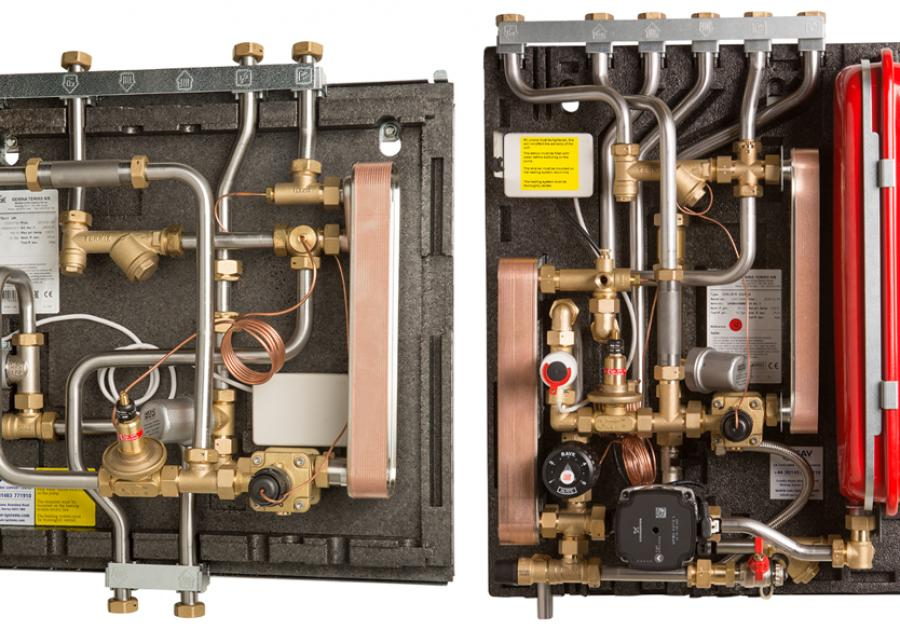 Internal components of Gemina Termix heat interface units, including plate heat exchangers, brass fittings, circulation pump and expansion vessel.