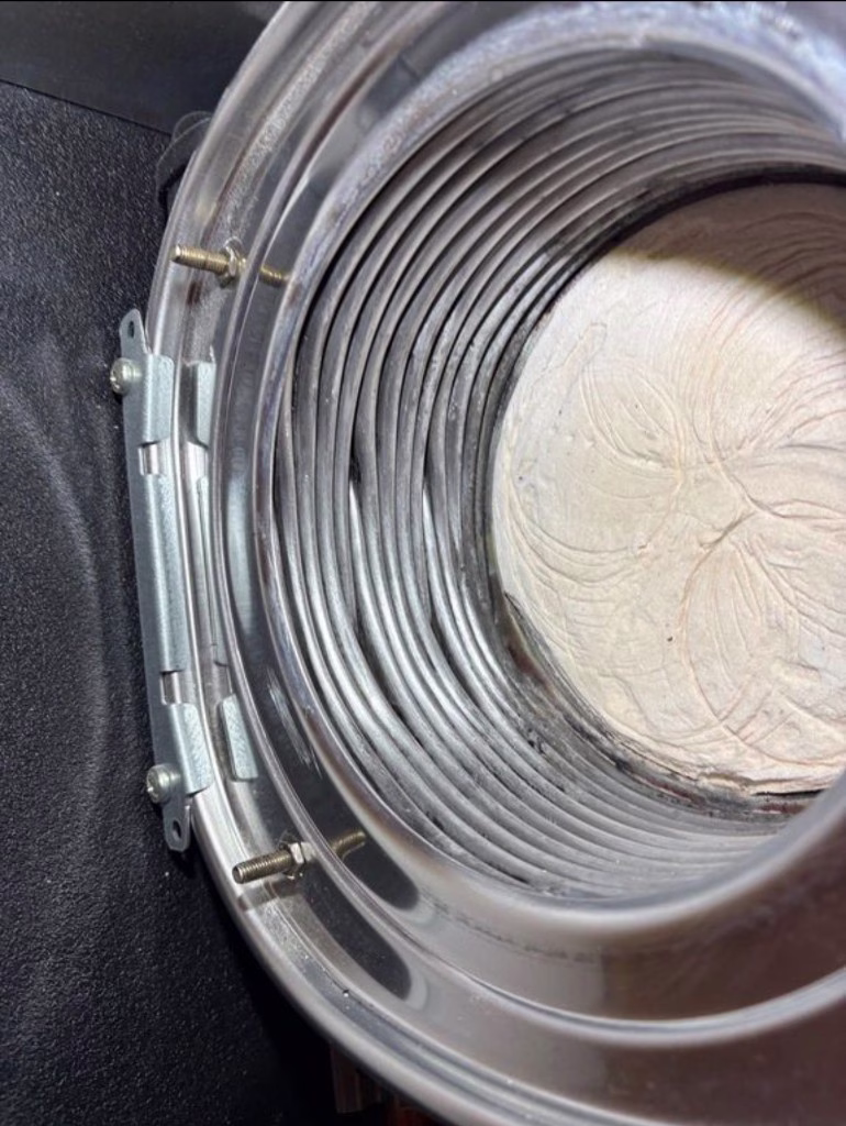 Clean boiler heat exchanger coils after professional servicing