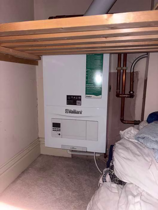 Vaillant ecoTEC Plus boiler in a Wimbledon airing cupboard attended during an emergency heating repair